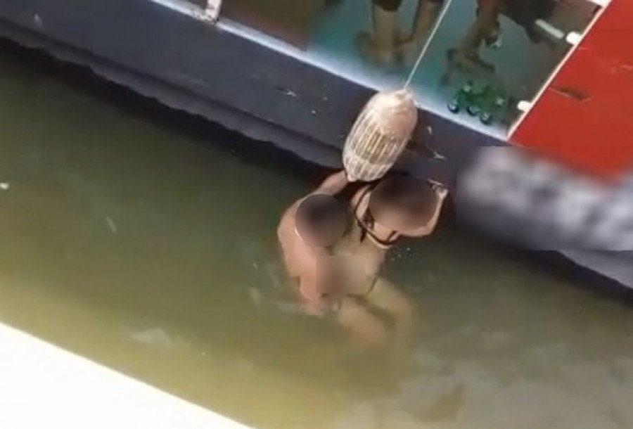Casal foi filmado fazendo sexo em público no lago de Palmas ao lado de flutuante (Foto: Reprodução)